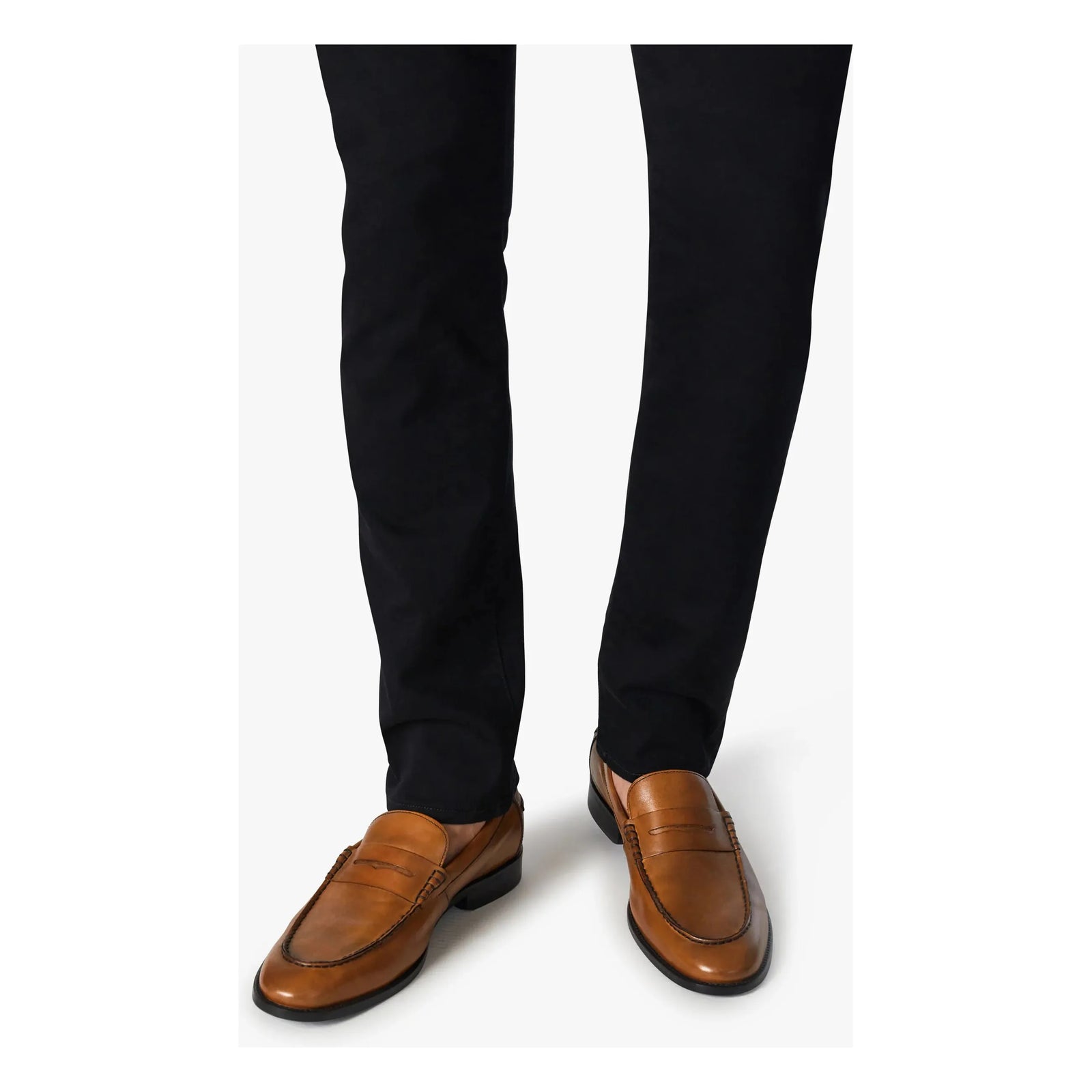 Stylish brown loafers paired with 34 Heritage Courage Black Vintage Comfort pants for modern comfort and elegance.