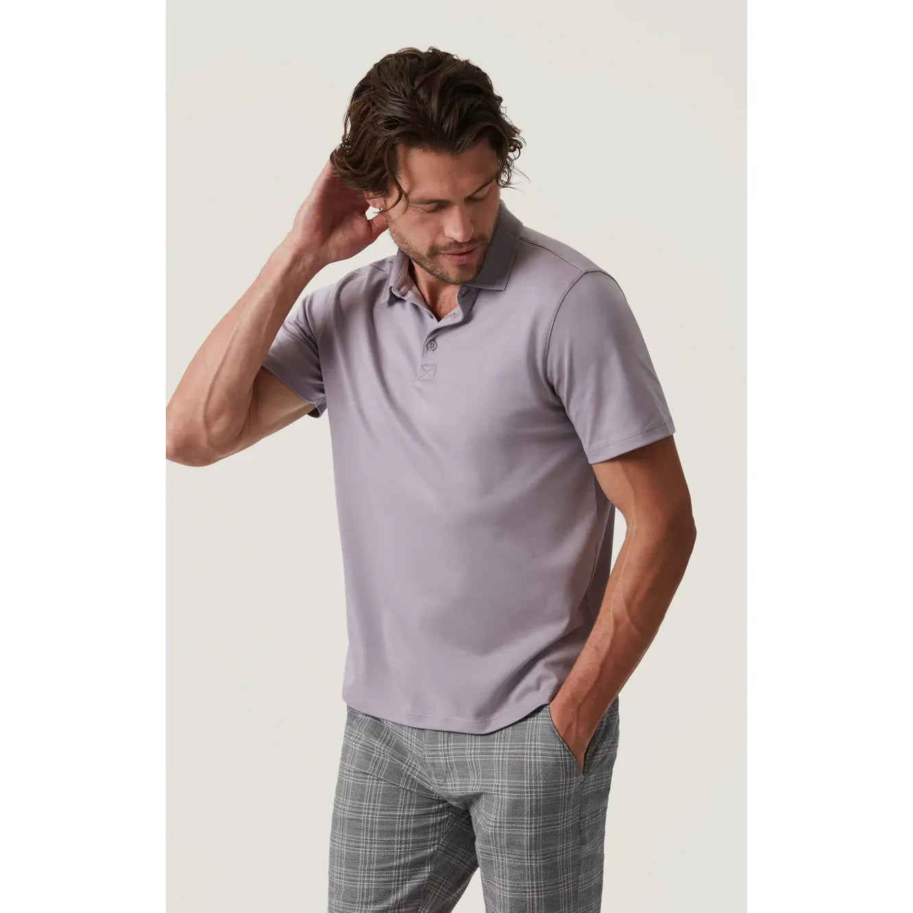 34 Heritage Polo Shirt in lilac on a model, three-button neckline and slim, close fit