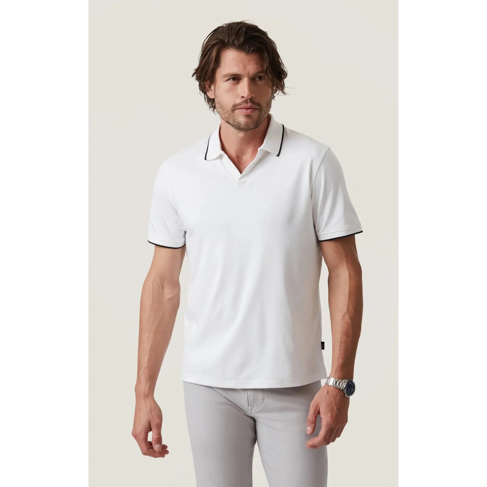 Stylishly modern, the 34 Heritage Riviera Polo features elegant white lining, perfect for any occasion or golf day.