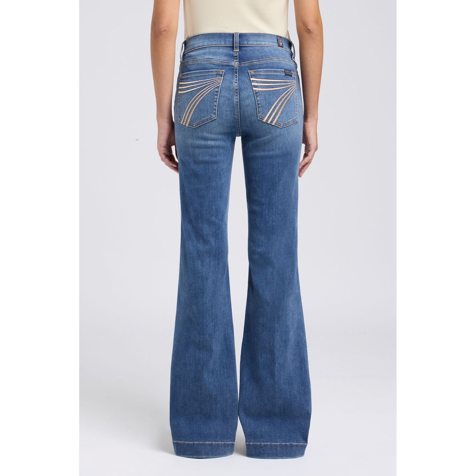 7 for all Mankind Dojo in Gale, back view mid-rise flare jeans with curved back-pocket embroidery.