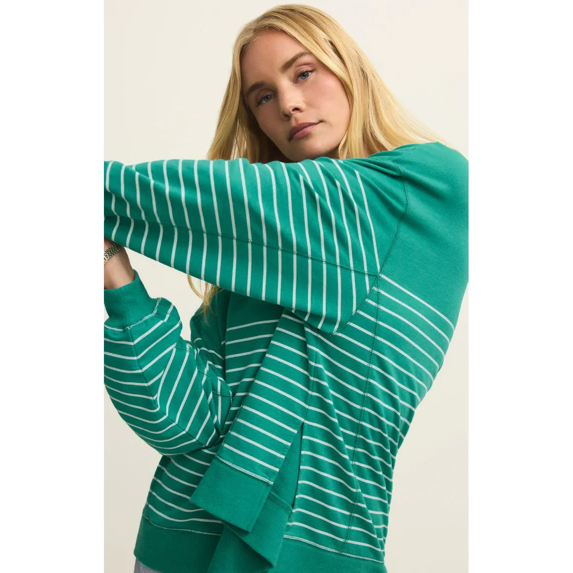 Model wearing Z Supply Modern Weekender Stripe Sweatshirt in green and white stripes, relaxed fit, buttery soft terry.