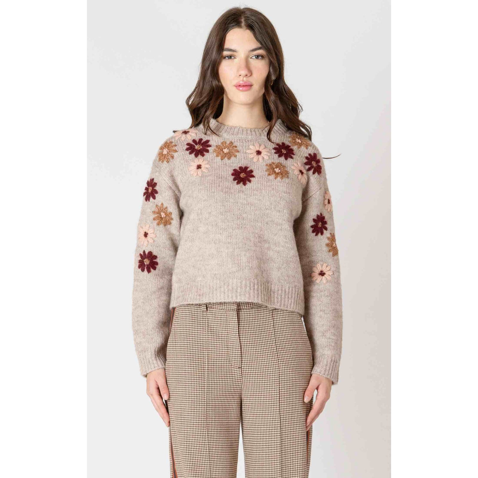 Dex Black Tape Floral Applique Crew Sweater in beige knit with pink, tan, and burgundy floral appliques.