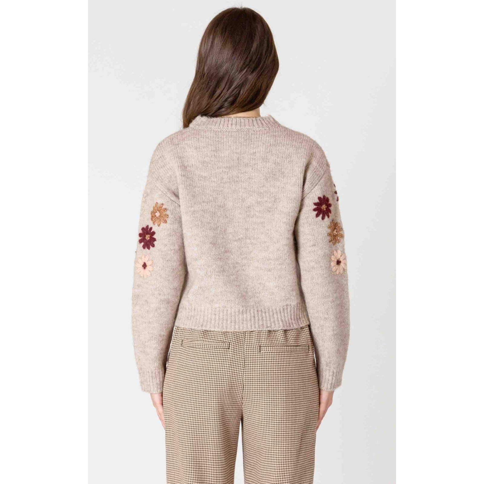Dex Black Tape Floral Applique Crew Sweater, beige knit with floral appliques on sleeves.