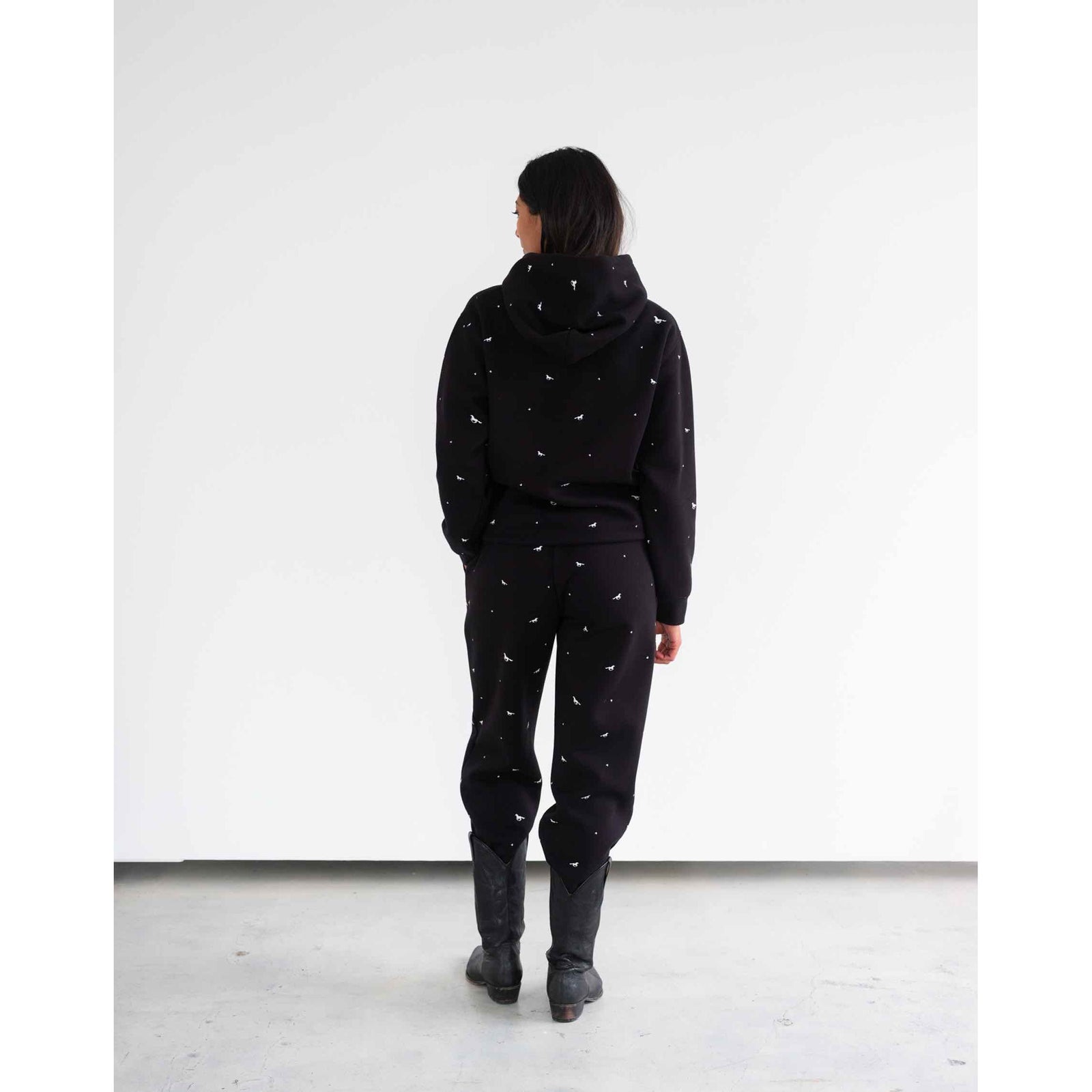 Brunette the Label All Over Horse Hoodie in black with white horse print, back view.