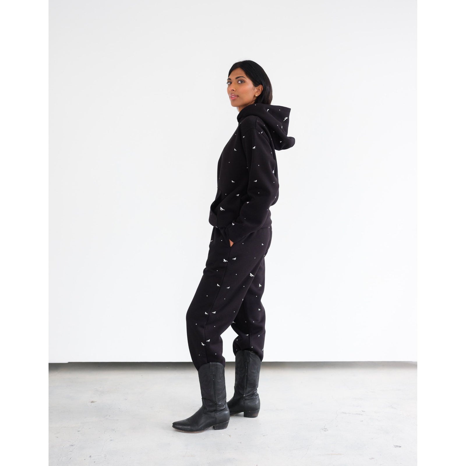 Brunette the Label All Over Horse Hoodie with an all-over horse print and relaxed fit, worn by a model.