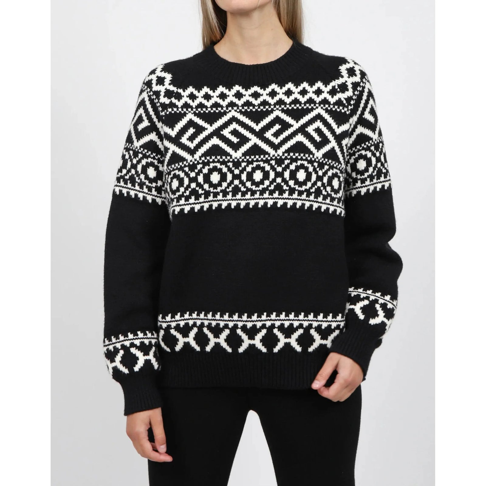Brunette the Label Fair Isle Sweater in black with white geometric pattern and oversized drop-shoulder fit.