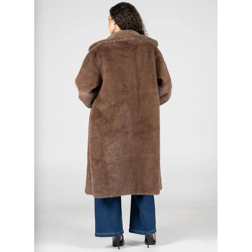 C'est Moi faux fur long coat in brown with lapel collar, snap-button accents, elastic sleeves, back view.
