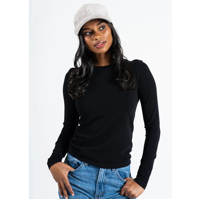 C'est Moi Plush Baseball Hat in beige plush on a model wearing a black top and jeans.