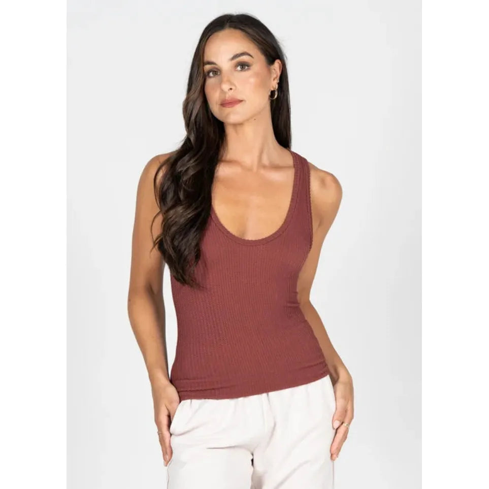 Burgundy textured scoop-neck tank top made from a soft bamboo rayon blend, featuring a fitted silhouette and hip-length cut.