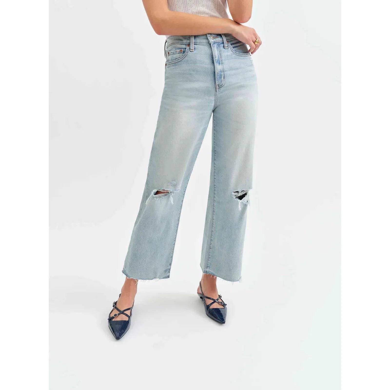 Daze Pleaser High Rise Wide Leg Ankle in Charisma features stylish distressing and a vintage light wash for a chic look.