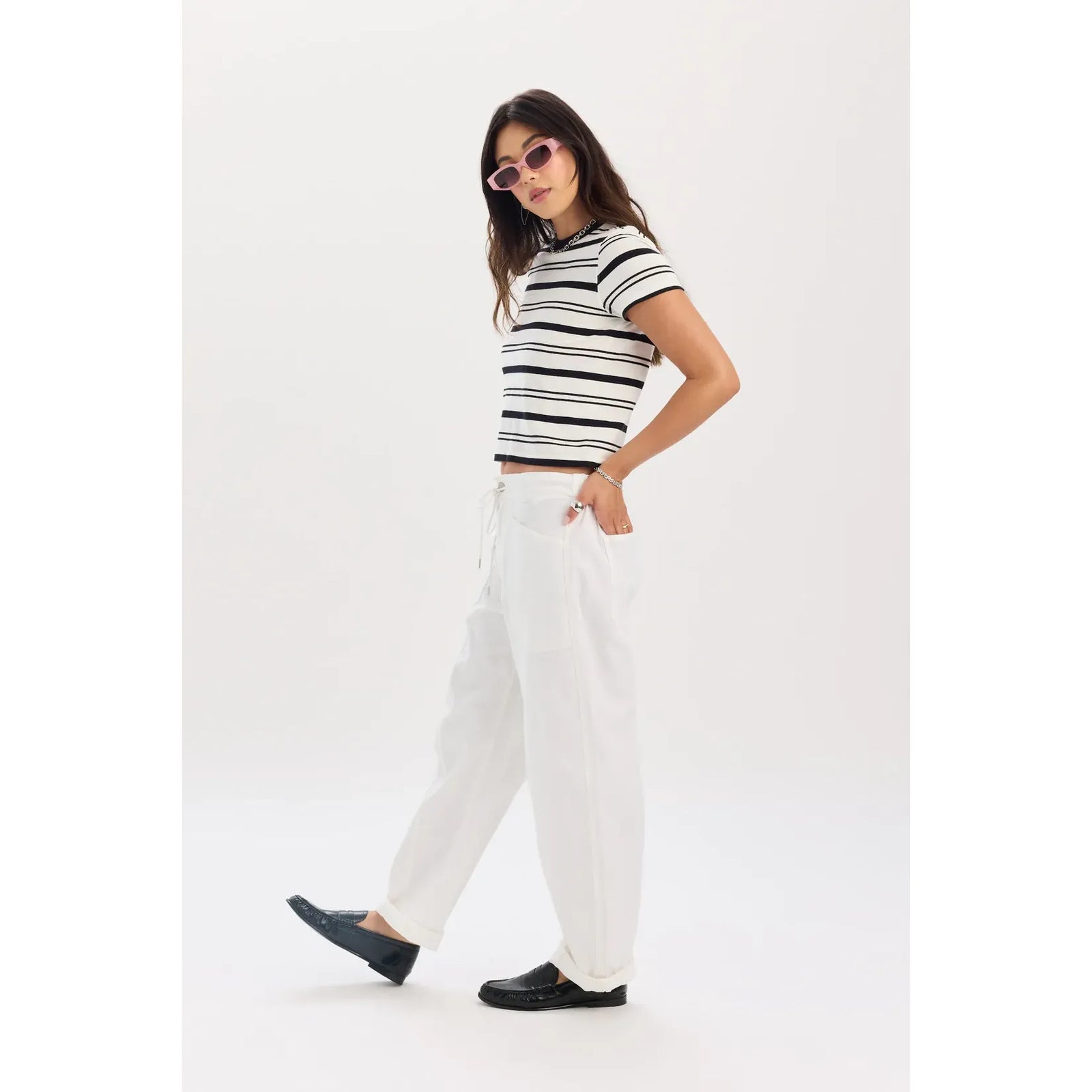 Daze Villa Drawstring Barrel Pant in Lamb: white tapered pants with a drawstring waist.
