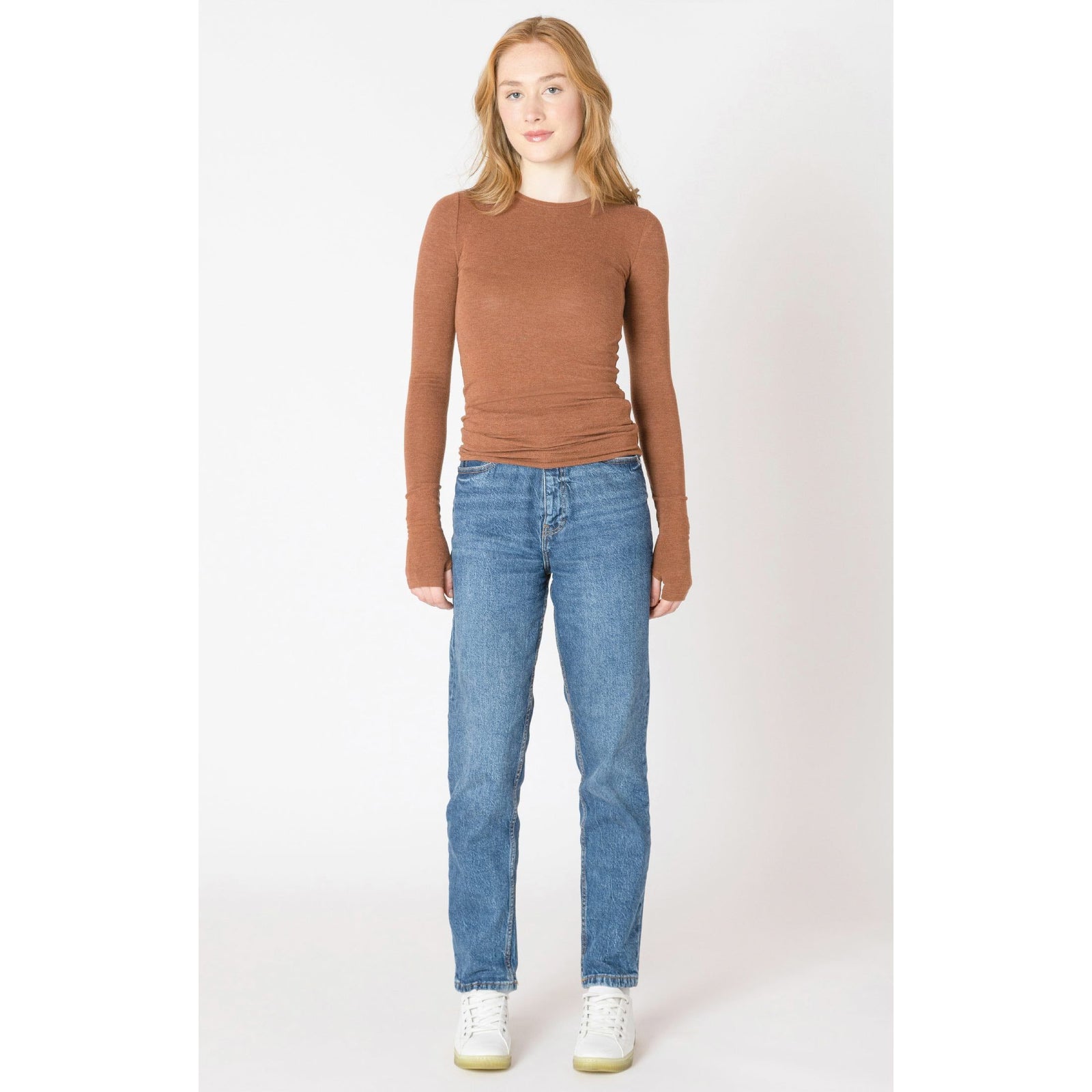 Stylish woman wearing the Dex Brushed Crewneck Tee in chestnut heather, perfect for fall layering or solo wear.