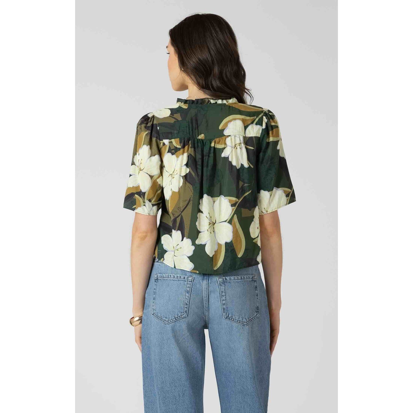 Dex Button Front Ruffle Trim Blouse in dark green floral print, back view with puff sleeves.