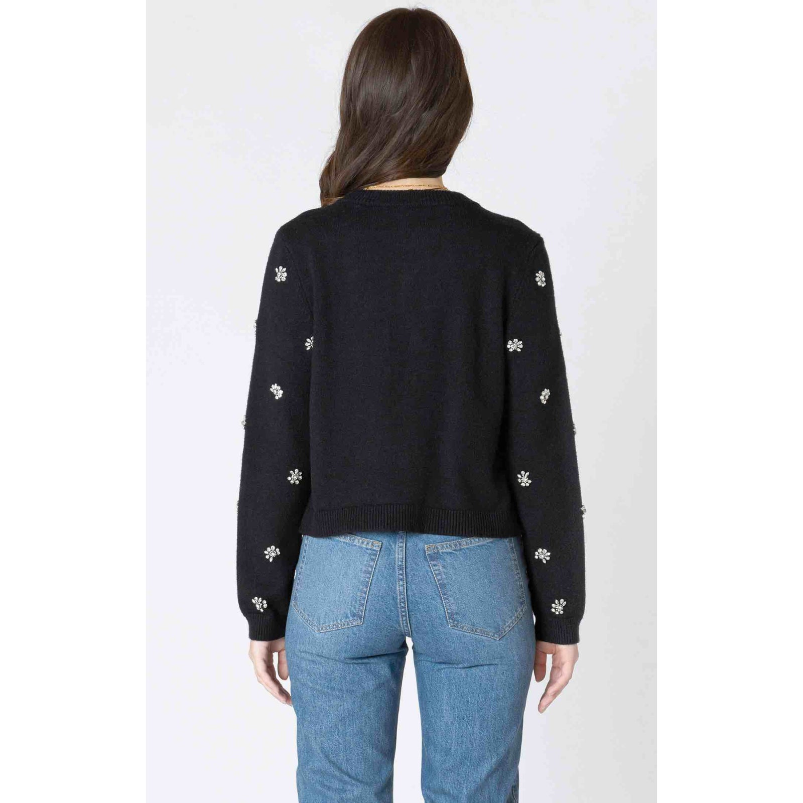 Back view of navy Dex Embellished Tie Front Cardigan with white floral bead embellishments on sleeves.