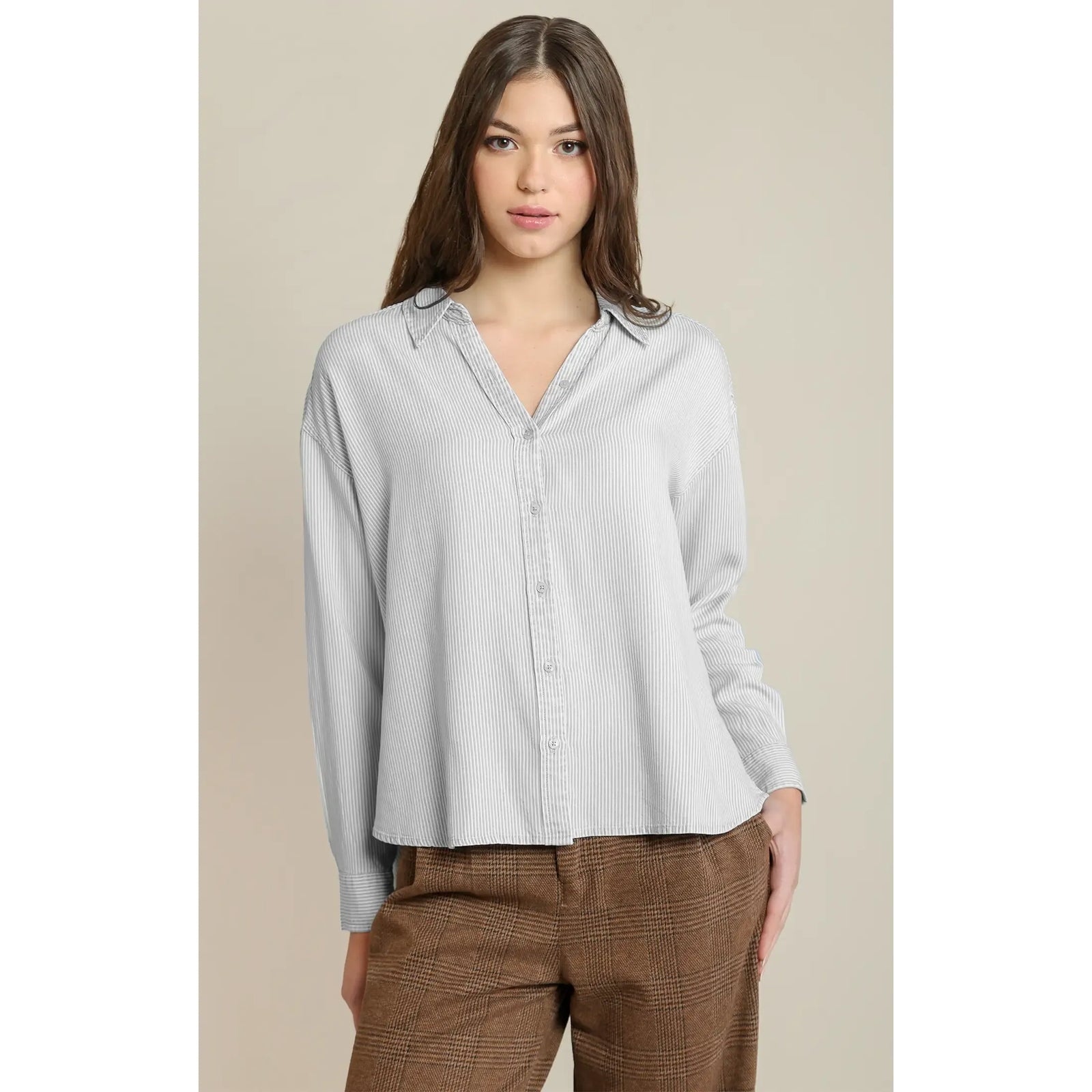 Relaxed button front shirt with subtle white stripes, Tencel fabric, and comfortable fit for casual fall layering.