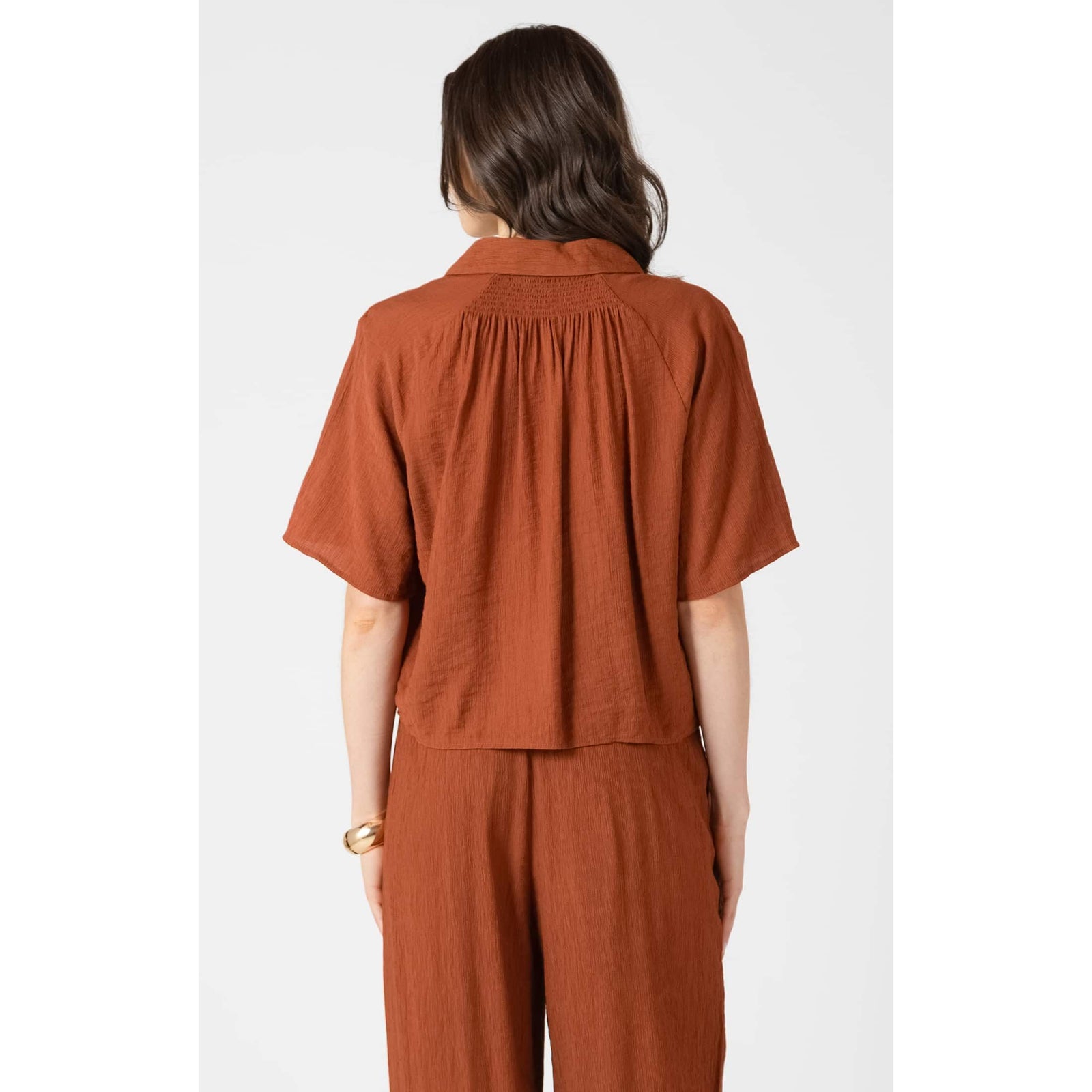 Dex Short Sleeve Blouse in rust, relaxed fit with gathered back yoke and breezy short sleeves.