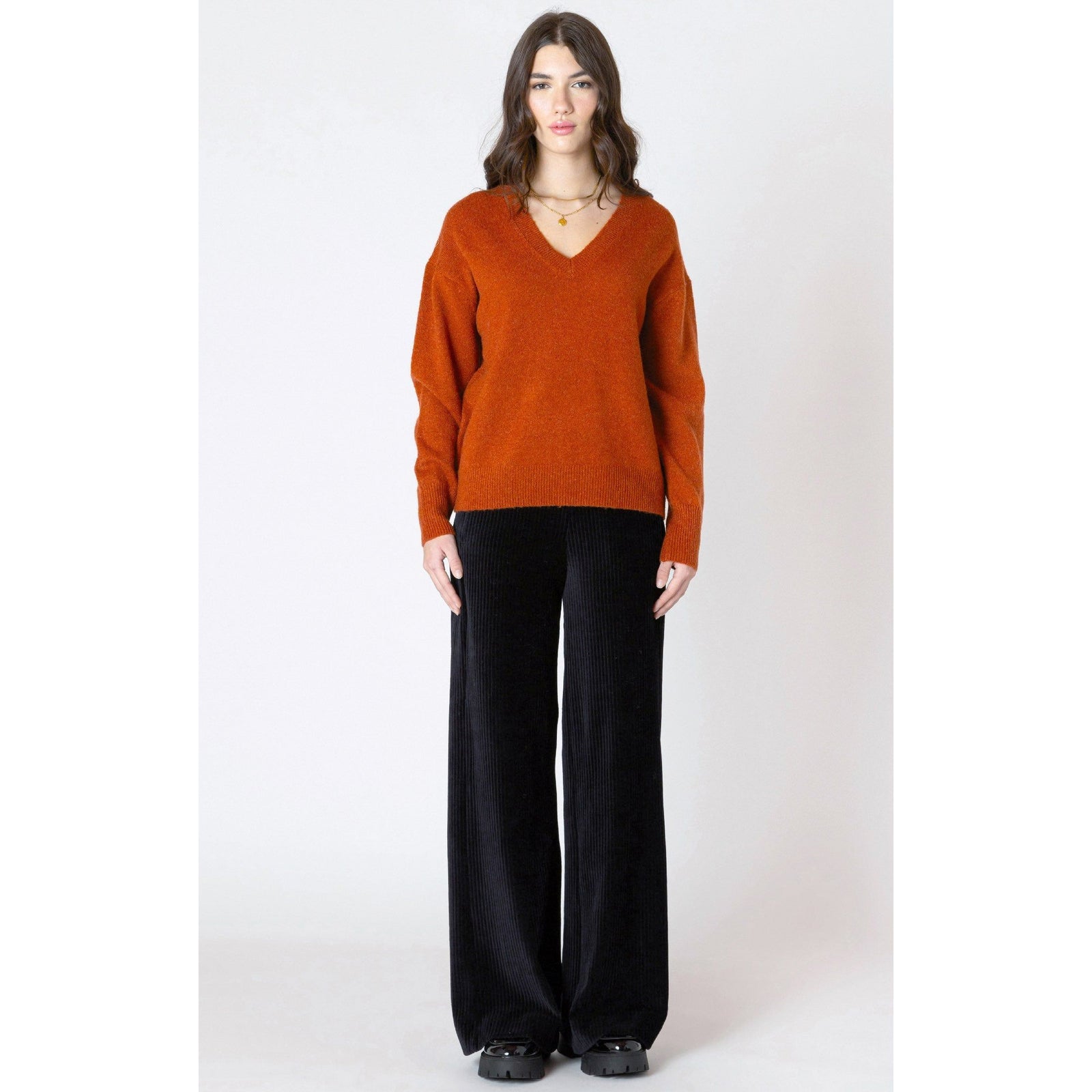 Cozy up in the burnt orange Dex Soft Touch Sweater, featuring a flattering V-neck, perfect for autumn days.