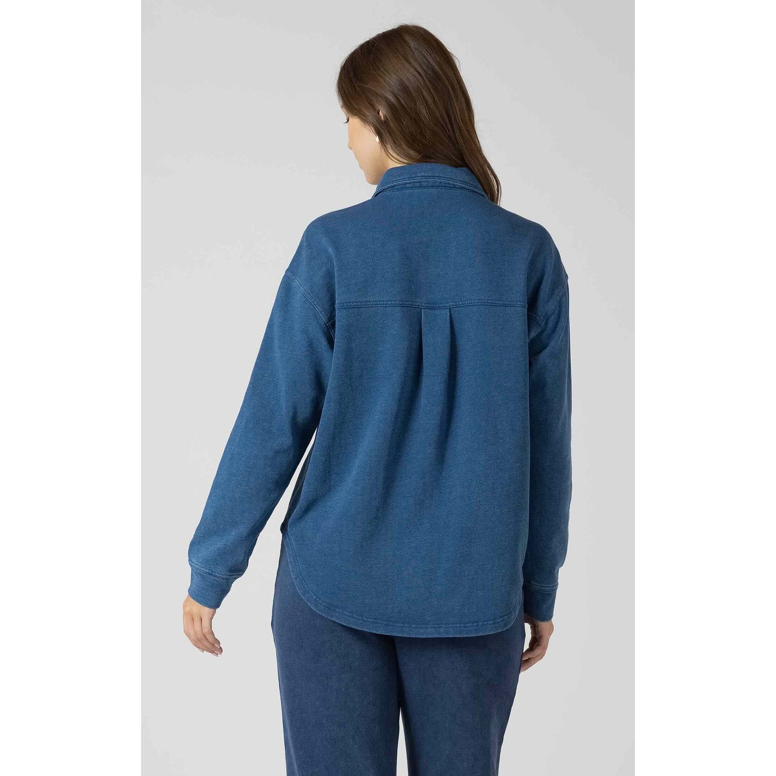 Indigo Dex Washed Knit Shirt, back view with center back pleat and relaxed fit, long sleeves.