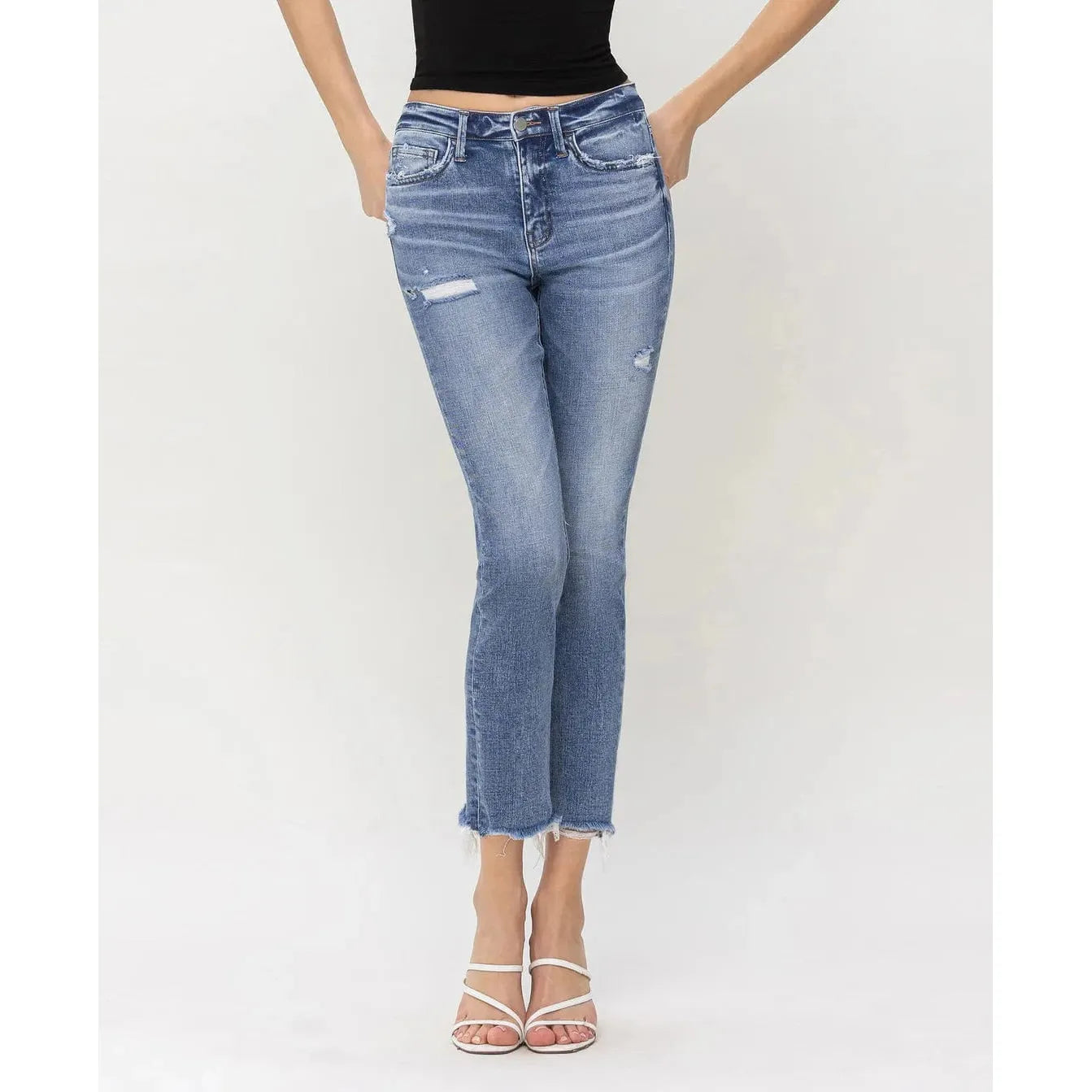 Stylish Flying Monkey Aspiration High Rise Slim Straight jeans with a chic fit and trendy raw hemline. Perfect for any occasion.