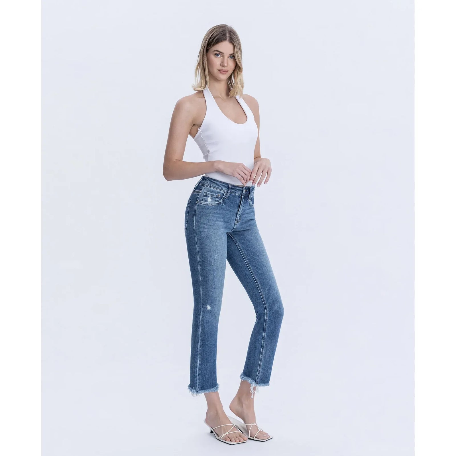 Flying Monkey Congenial mid-rise slim-straight cropped jeans with distressed details and frayed hem.