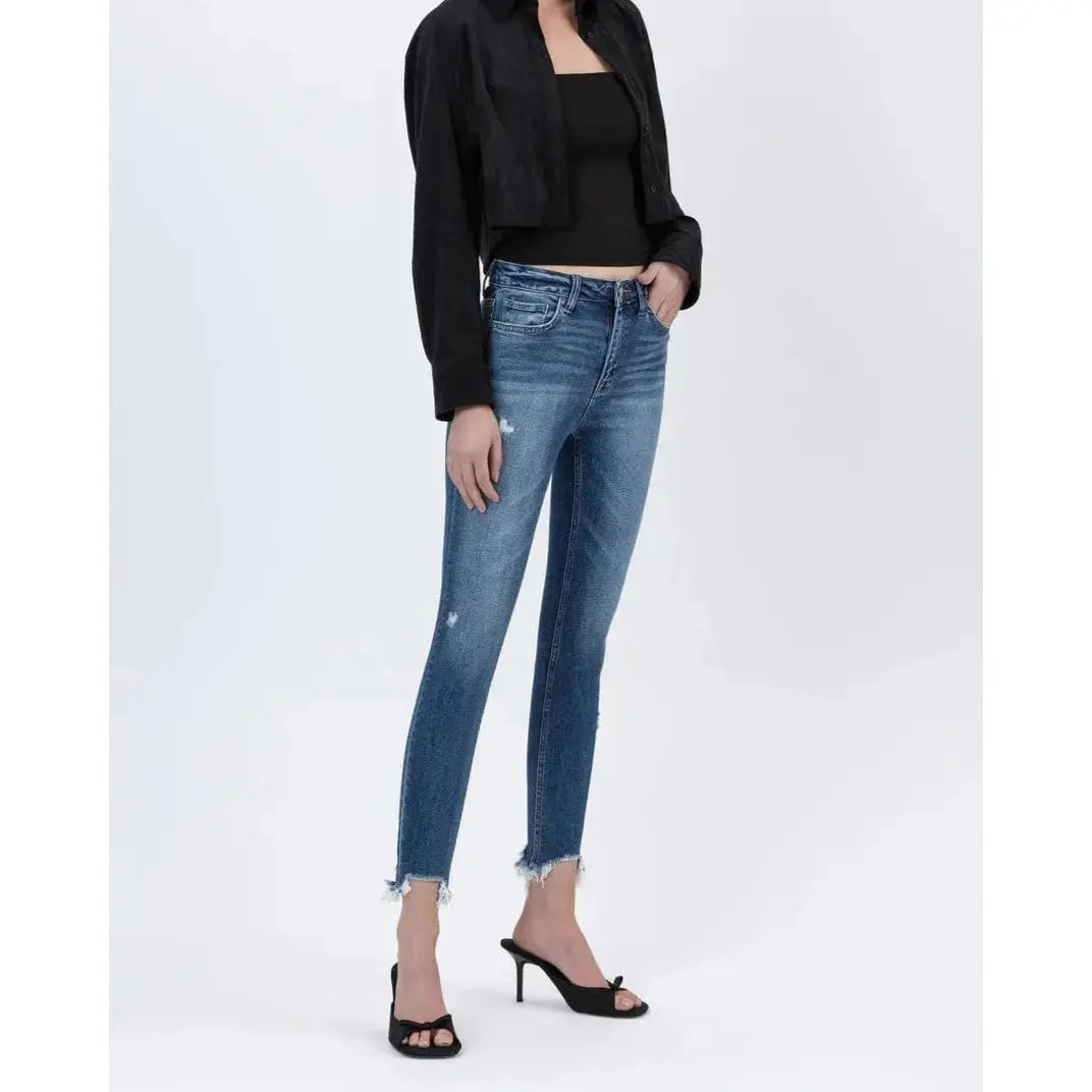 Stylish model showcasing Flying Monkey Counter Attack High Rise Crop Skinny jeans with trendy distressed accents.