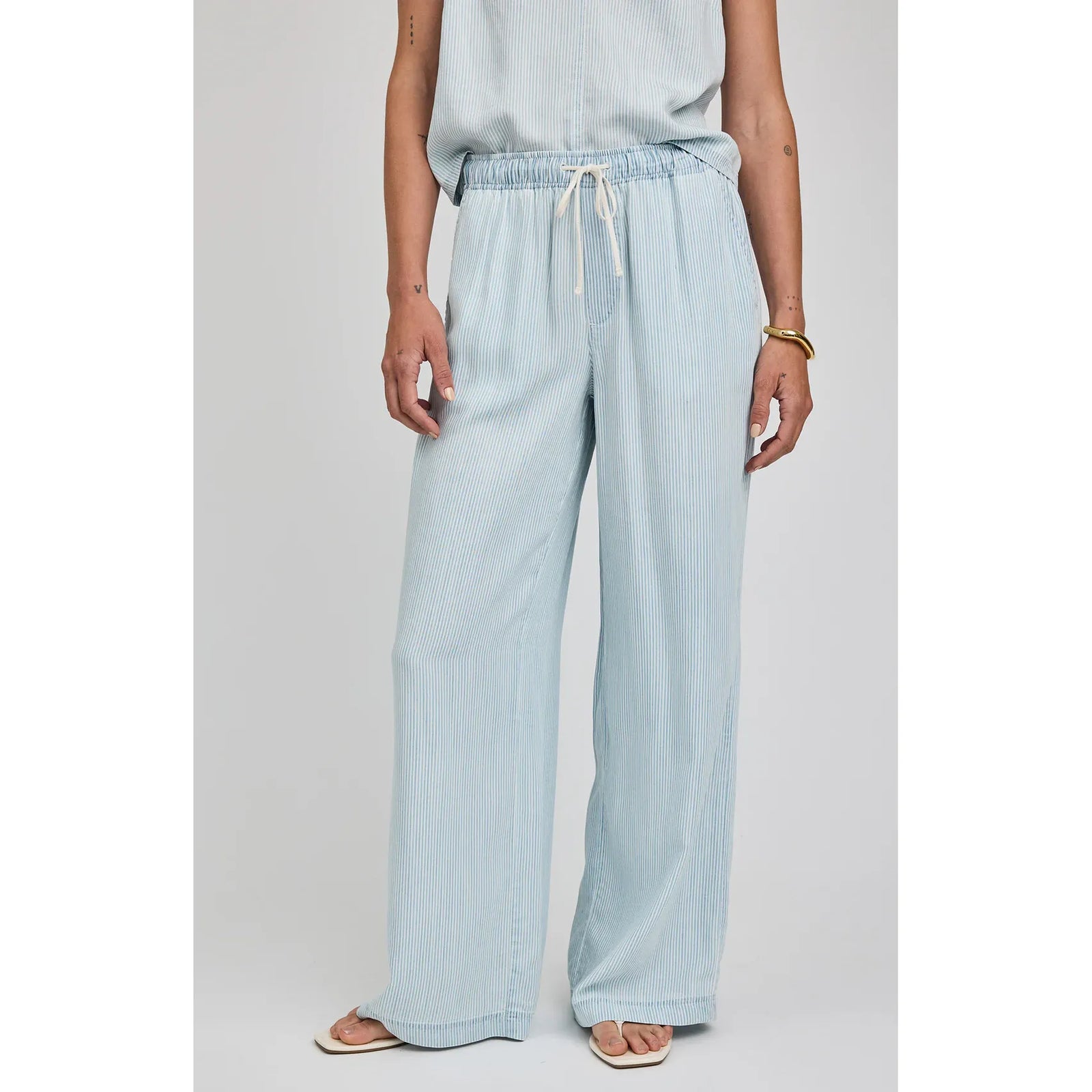 Gentle Fawn Camille Pant in light blue striped Tencel, wide-leg, mid-rise, drawstring waistband with slash pockets.