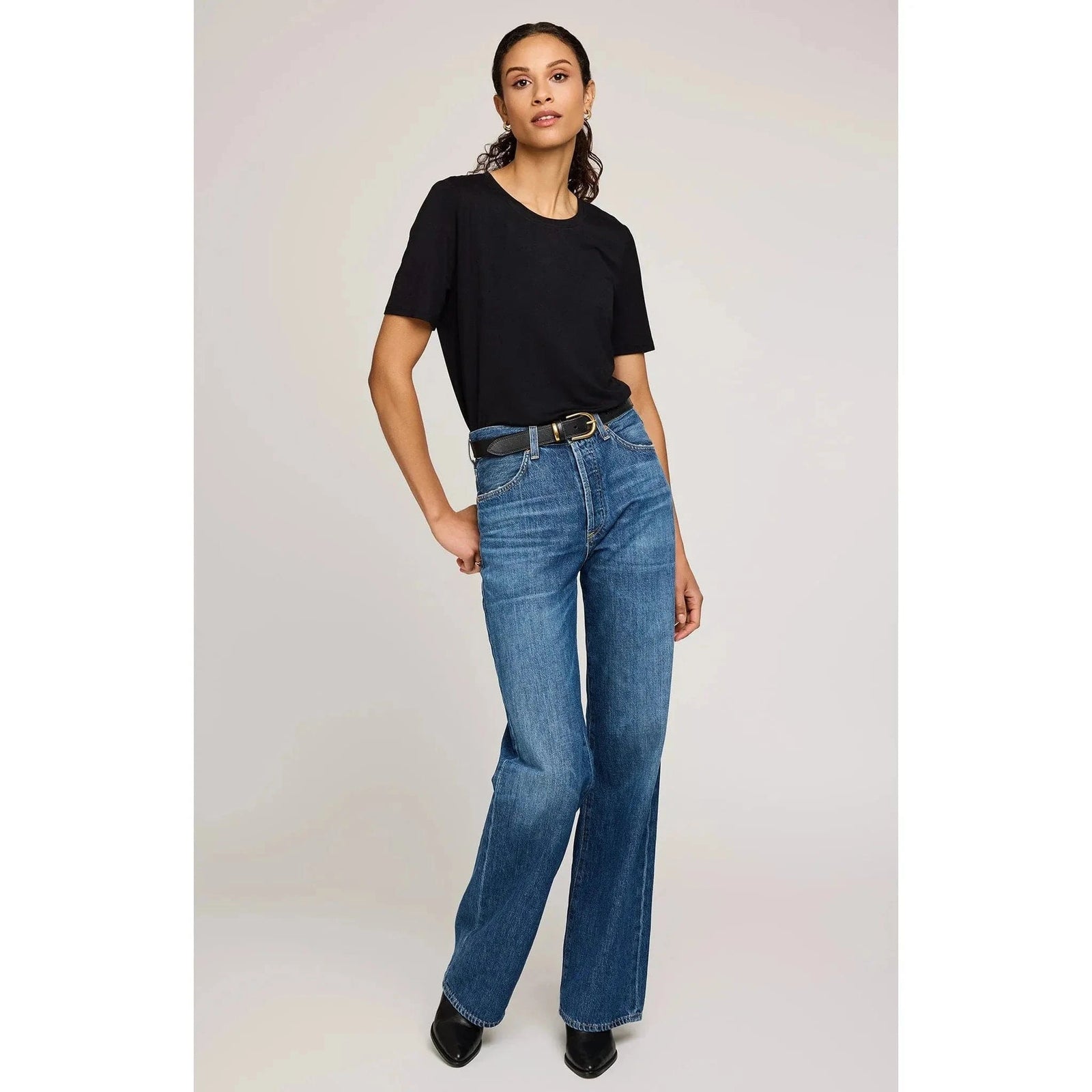Gentle Fawn Brielle TShirt in black EcoVero rayon jersey, crew neckline, relaxed fit, modeled with blue jeans.