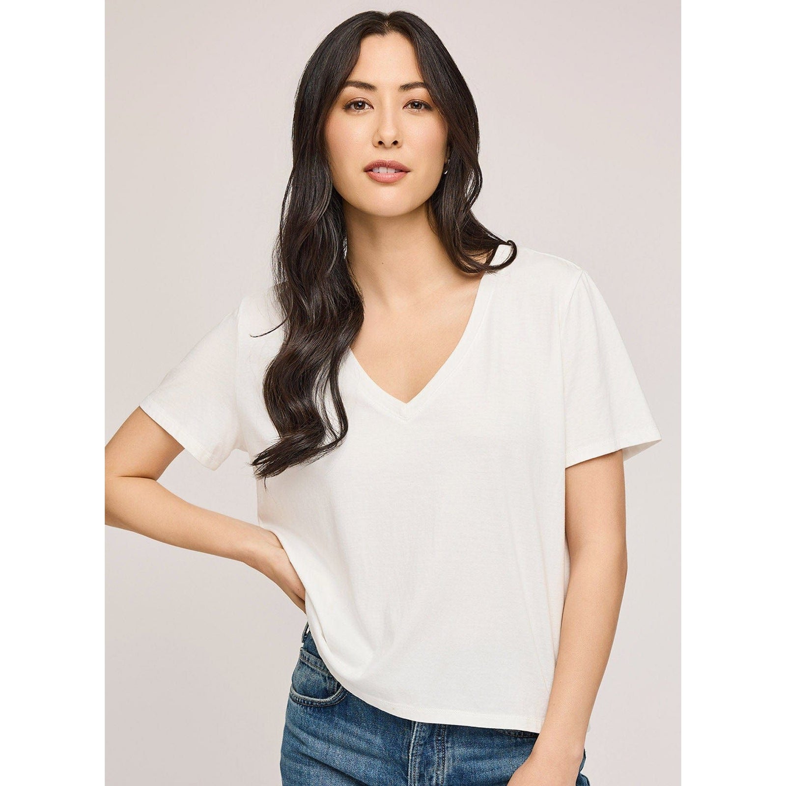 Gentle Fawn Lucy Top: white short-sleeve V-neck cropped cotton tee on a model.