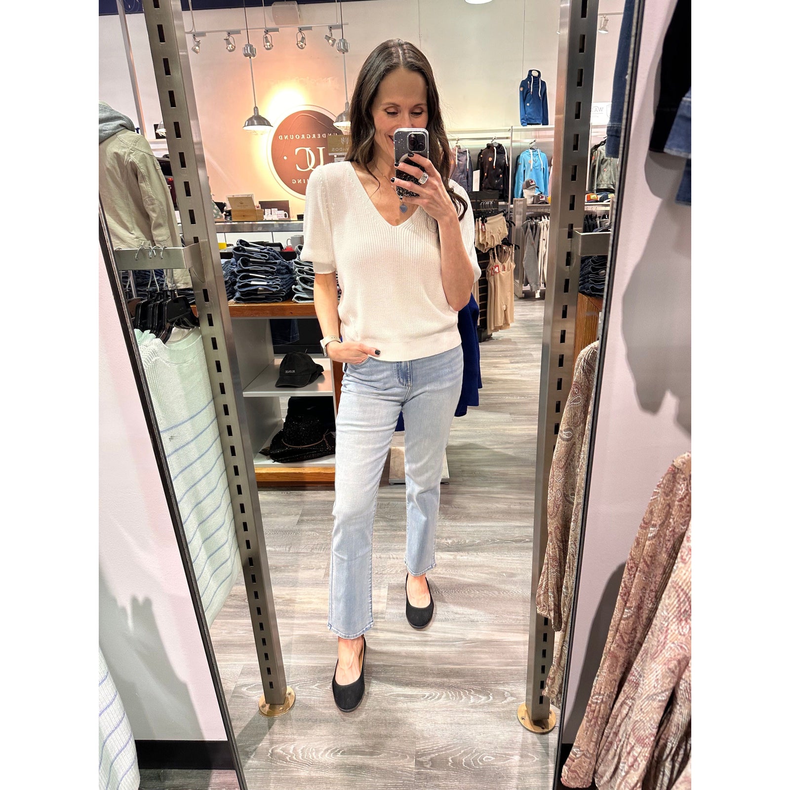 Gentle Fawn Phoebe V-Neck Sweater in white with puff sleeves, soft yarn, worn by shopper.