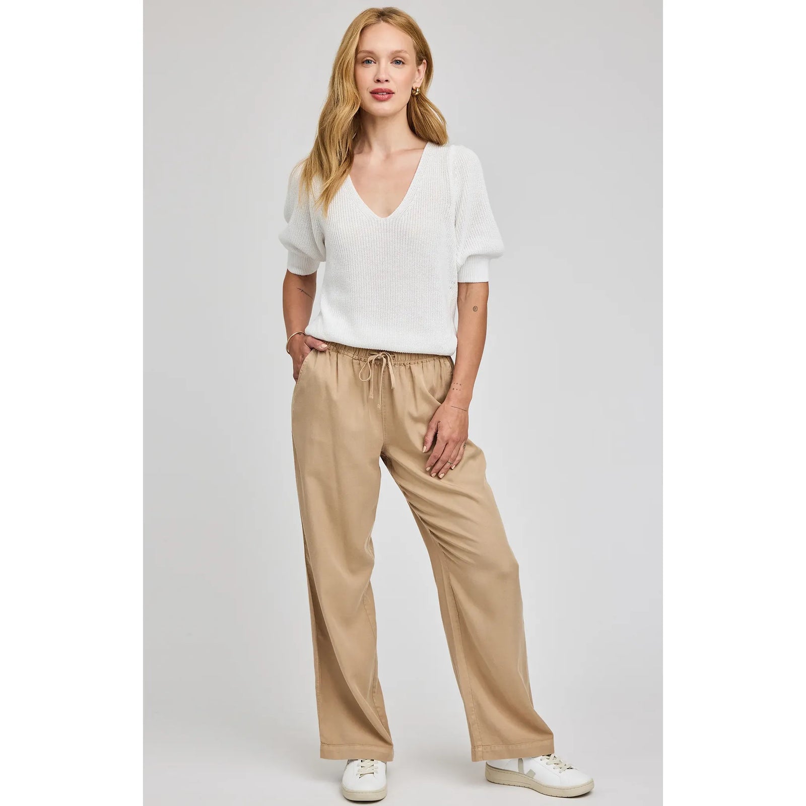 Gentle Fawn Phoebe V-Neck Sweater on model, white knit with puff sleeves and V-neck.