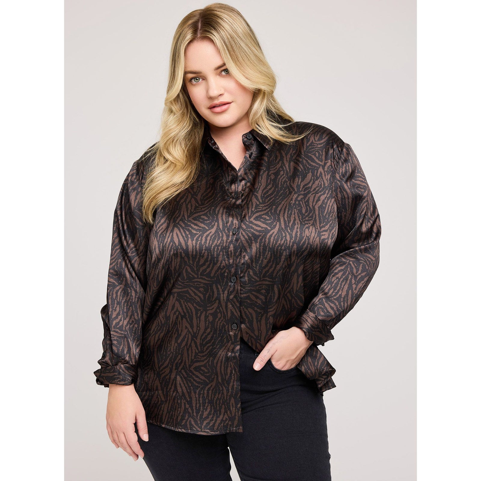 Gentle Fawn Simone blouse in hammered satin with a dark brown leaf-pattern and long sleeves.