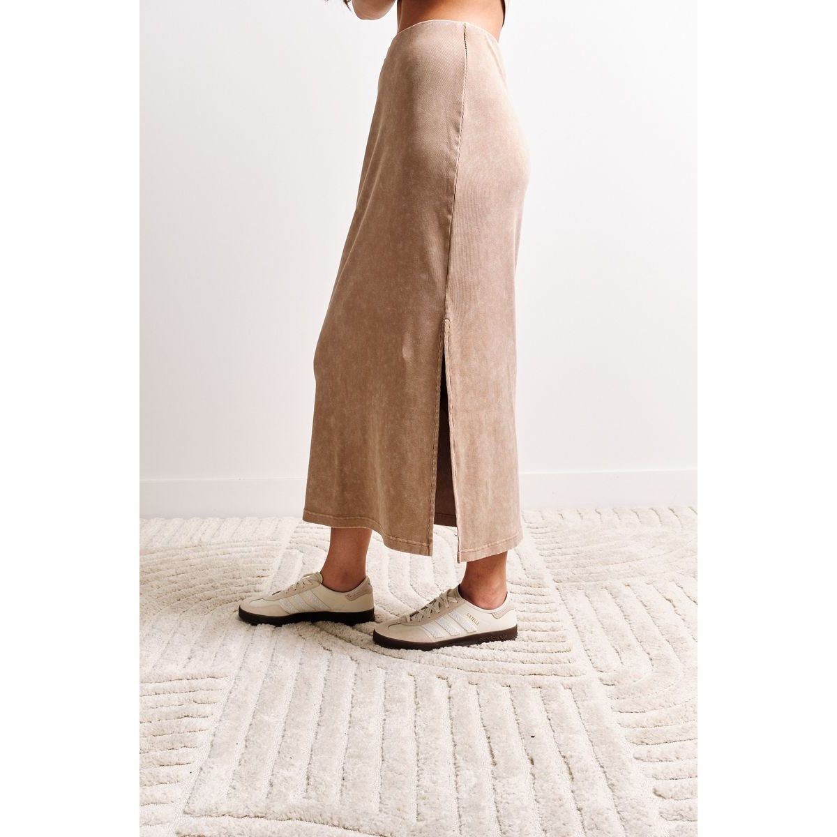 Kuwalla Pamerla Ribbed Shirt worn with beige midi skirt; wash in cold, hang to dry; size chart.