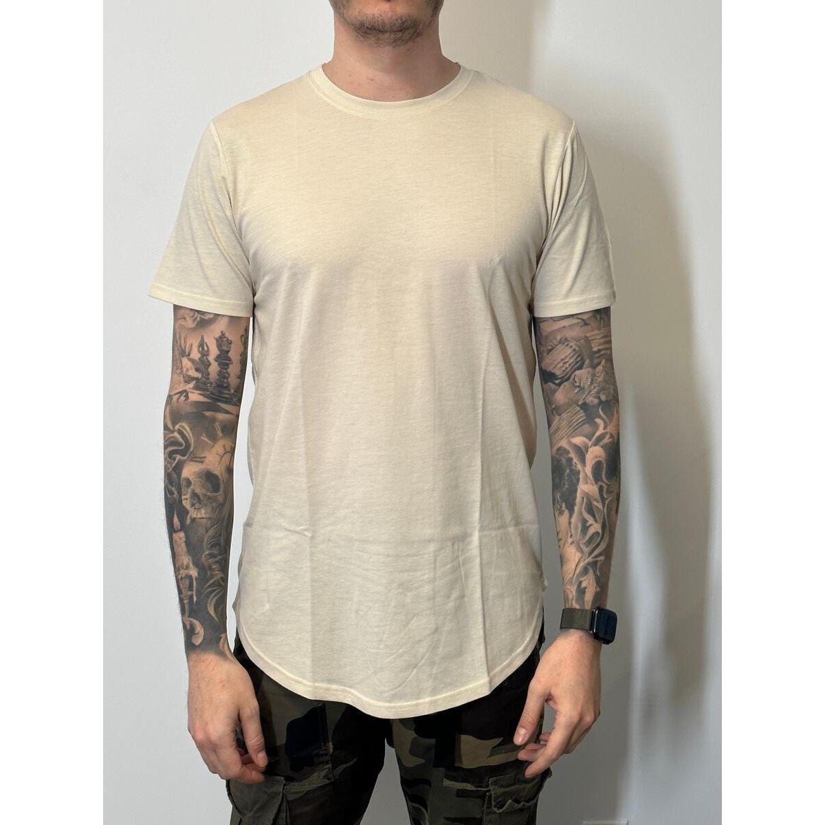 Kuwalla Scoop Tee in oatmeal on a model, scooped hem front and back, slim fit, brand label at back.
