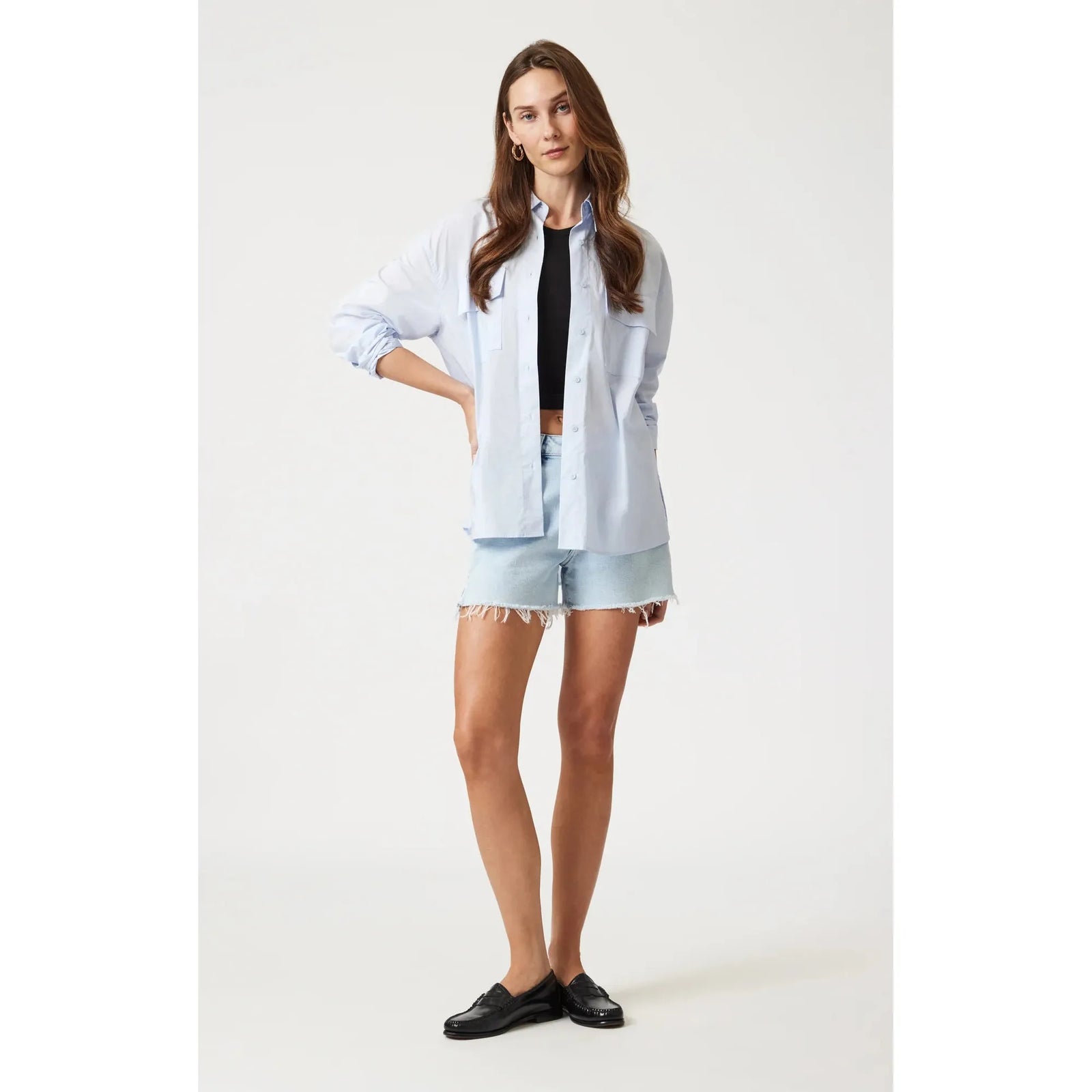 Elevate your style with Mavi Heidi Bleached 90's Shorts, featuring a vintage bleached wash and raw hem.