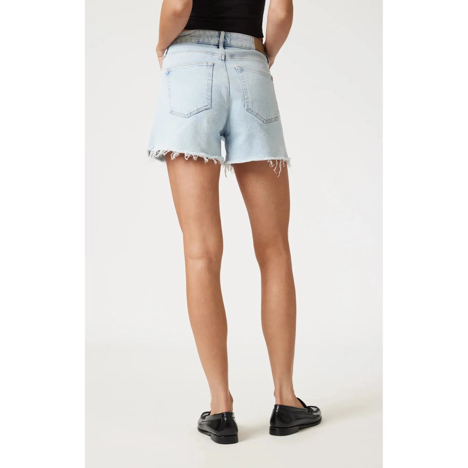Stylish Mavi Heidi Bleached 90's Shorts with high rise and raw hem, perfect for a vintage-inspired look.