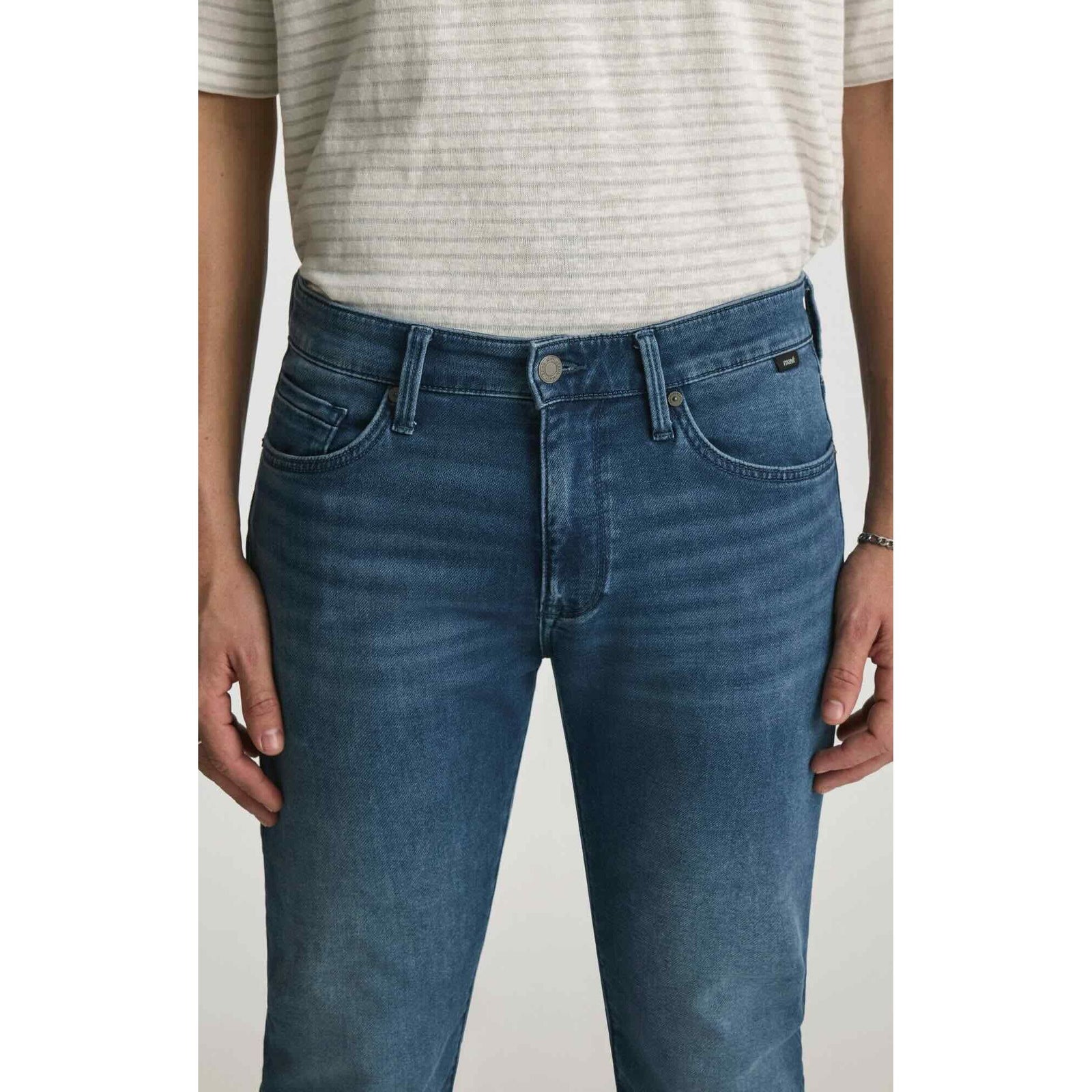 Mavi Jake Mid Explorer Denim jeans in medium blue, regular rise, slim through hip and thigh, front view.