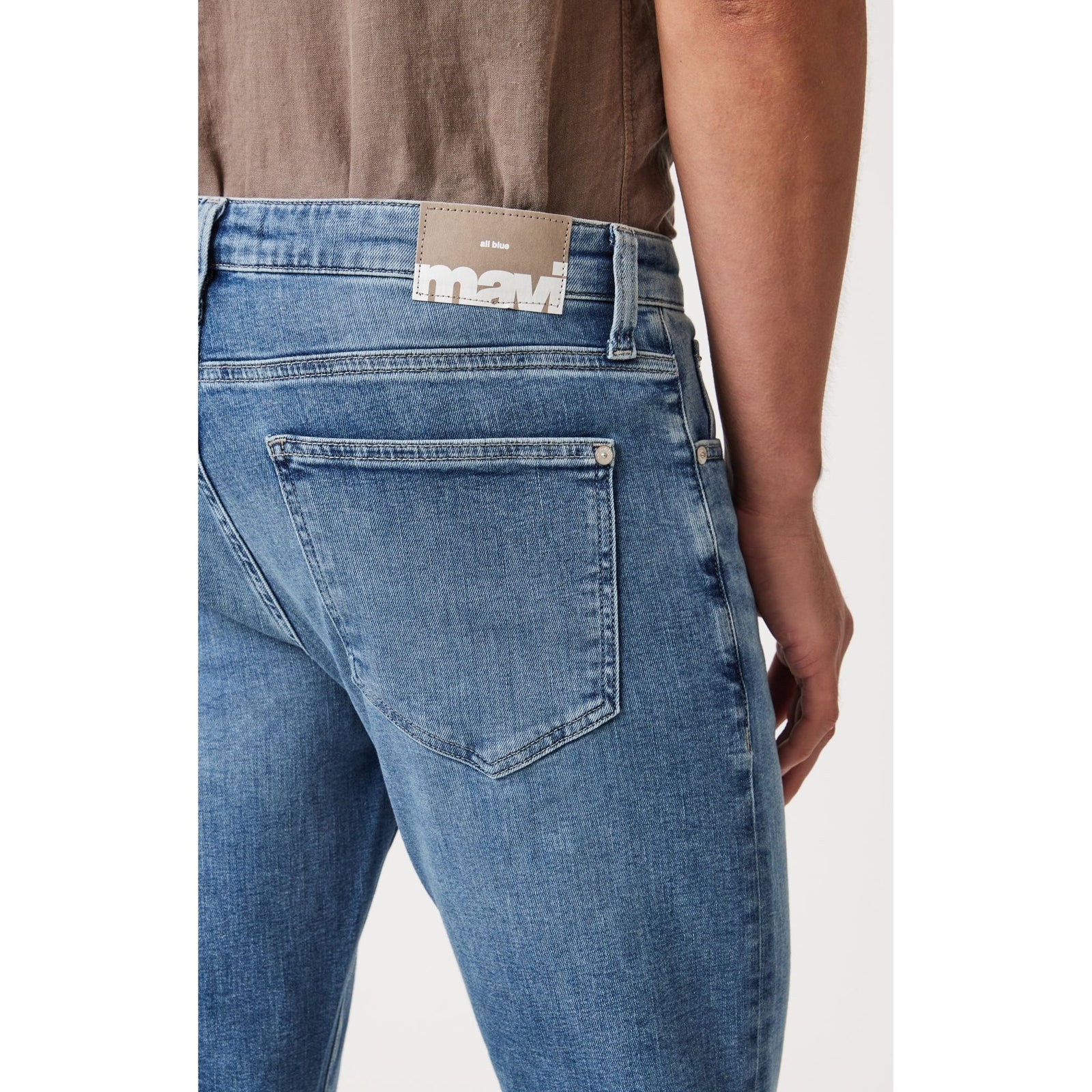 Mavi Josh Mid Brushed Classic Blue Bootcut jeans showcase a stylish back pocket design and a perfect fit for comfort.