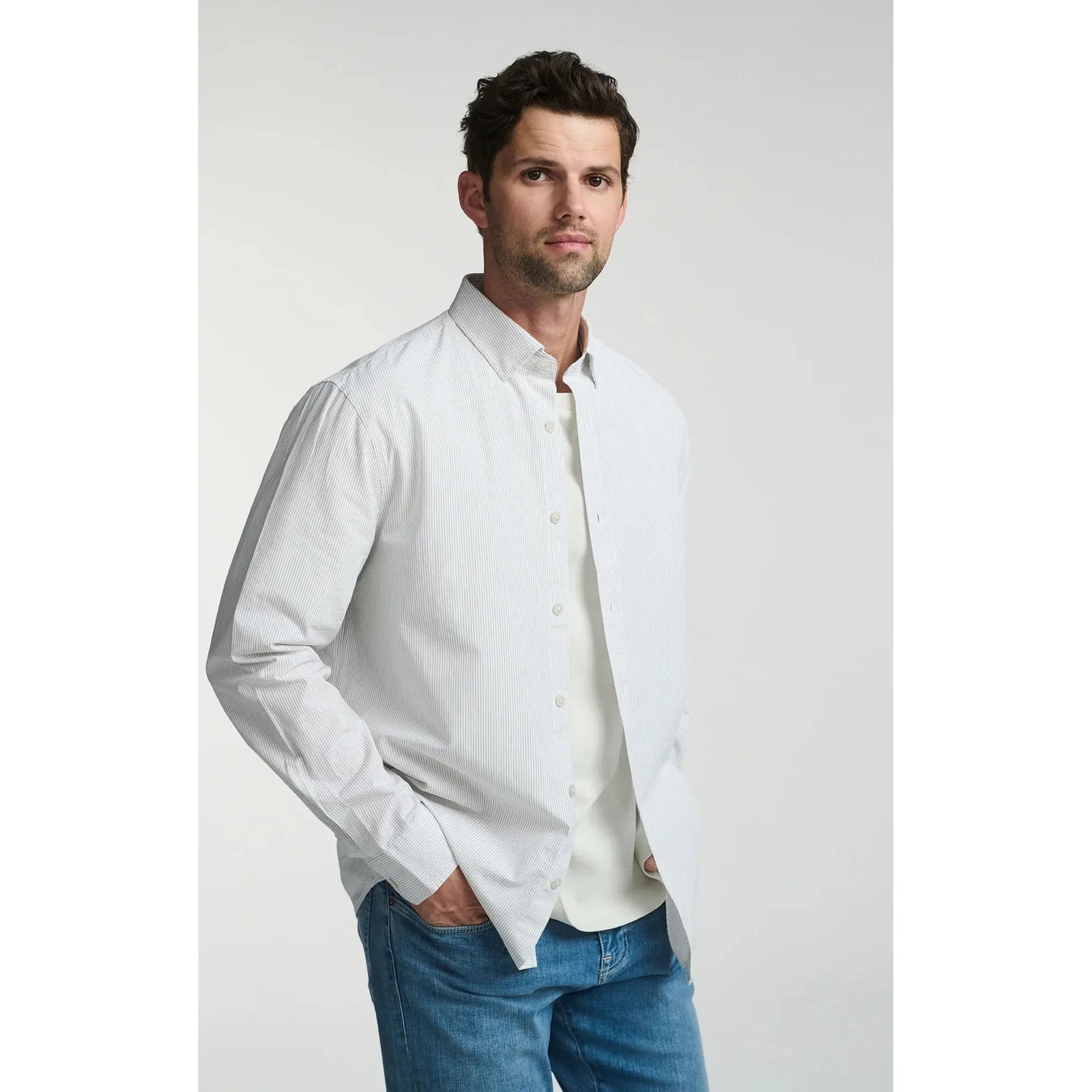 Elevate your style with the Mavi Long Sleeve Button Up Shirt, featuring subtle stripes for a polished look.