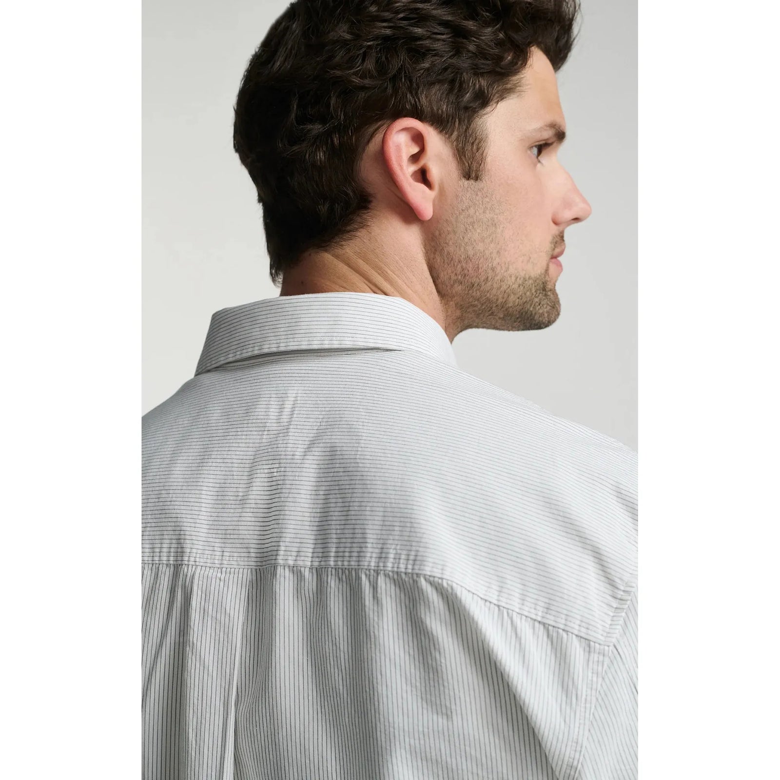 Mavi Long Sleeve Button Up Shirt features subtle stripes, perfect for a polished, versatile look.
