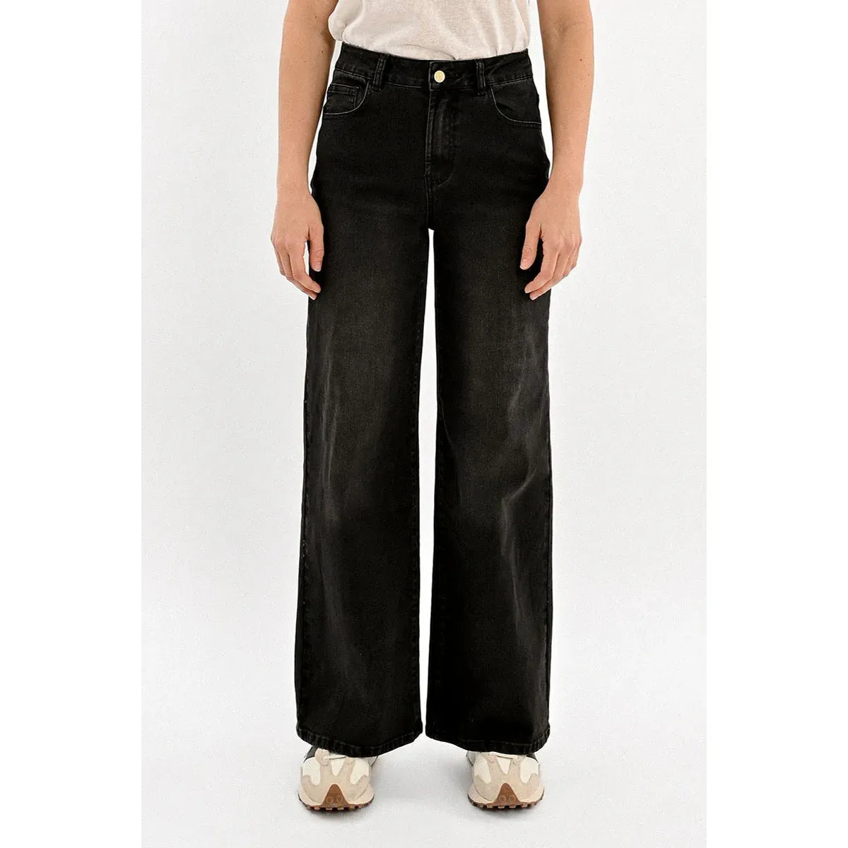 Molly Bracken Jamie wide-leg black denim pants, relaxed fit for taller figures, full-length on model.