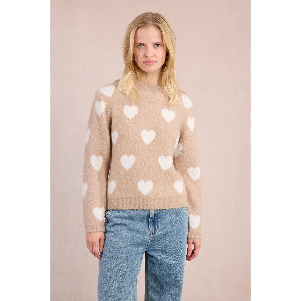 Molly Bracken Heart Sweater in beige with white hearts, long sleeves, round neckline, straight-fit on model