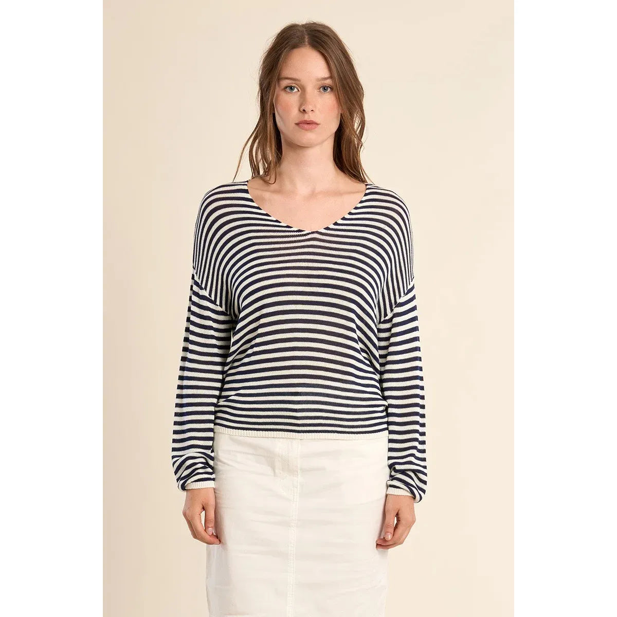 Molly Bracken navy-and-white striped long-sleeve sailor knit top with relaxed oversized fit and V-neck.