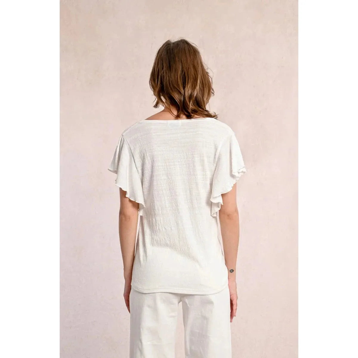 Molly Bracken Ruffled Tshirt showcases playful ruffled sleeves and a wide V neckline, perfect for effortless style.