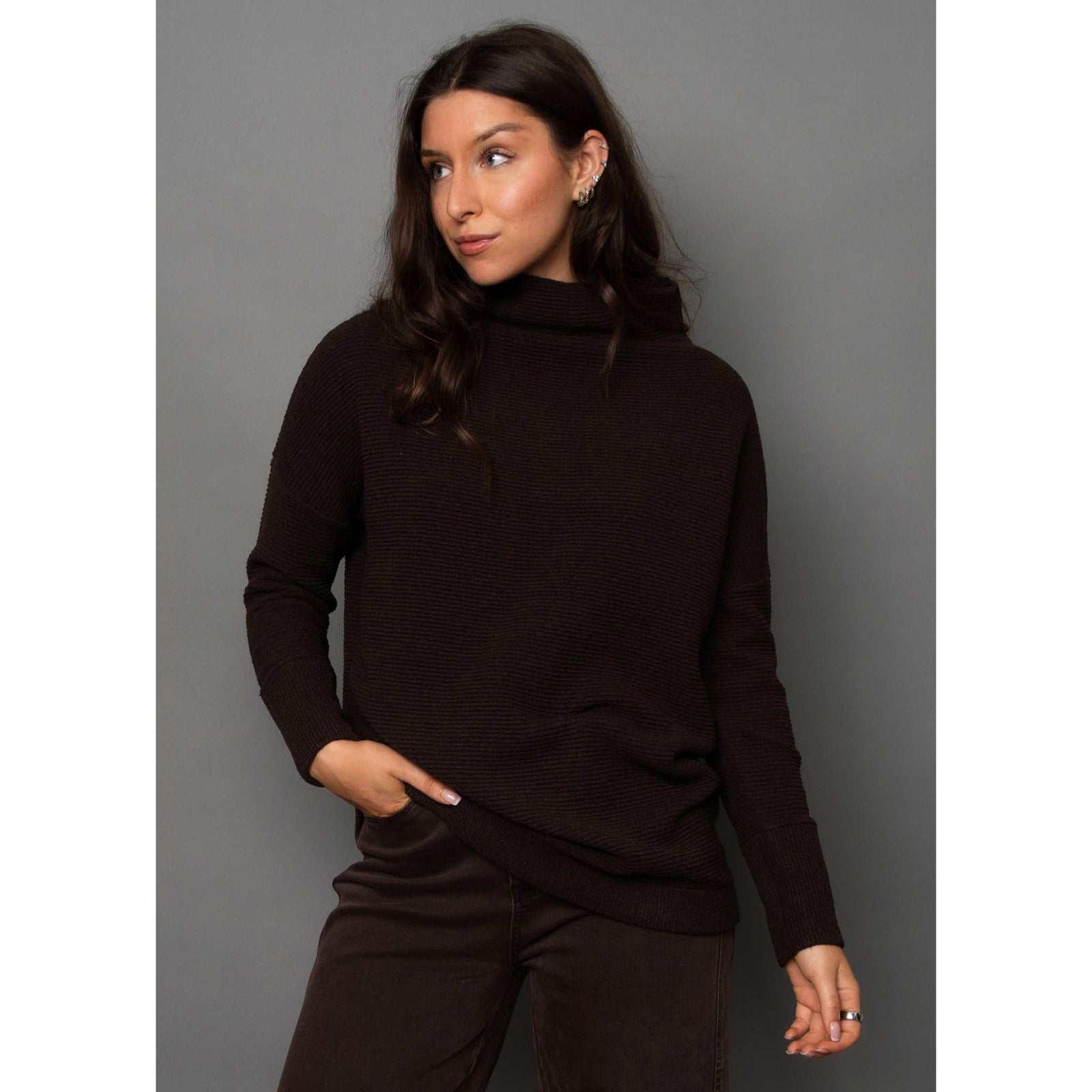 RD Style Ottoman Mock Neck Sweater on a model in dark walnut, a versatile year‑round top.