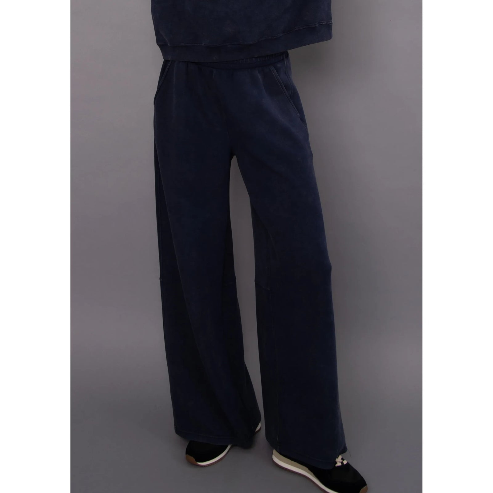 Navy mineral wash soft knit pull-on pants featuring a relaxed wide-leg fit, clean waistband, and subtle stripe details for everyday comfort.