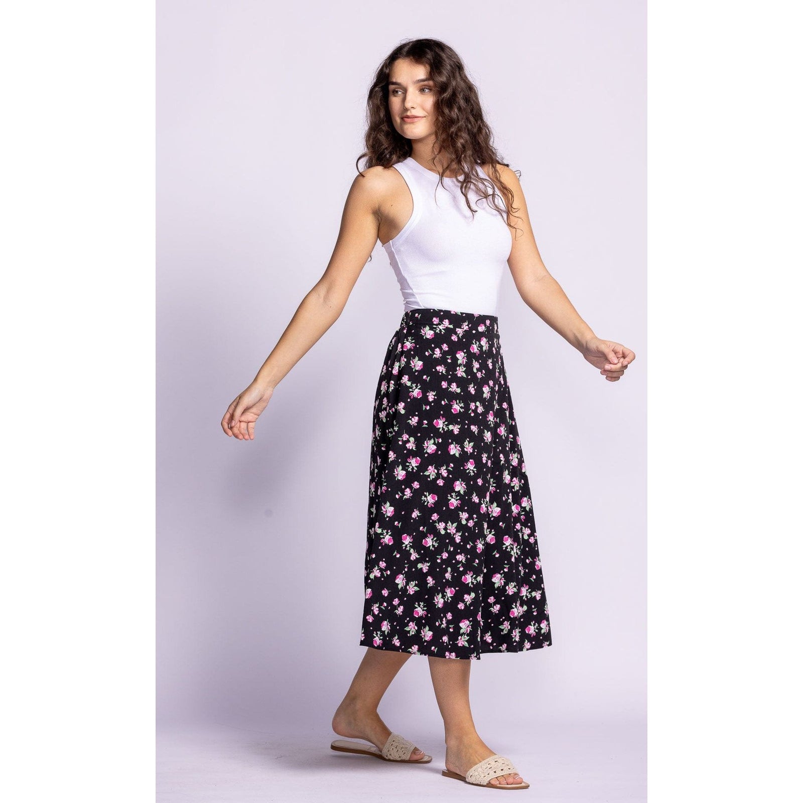 Flaunt your style in the Pink Martini Dolores Skirt, a playful floral midi perfect for summer days.