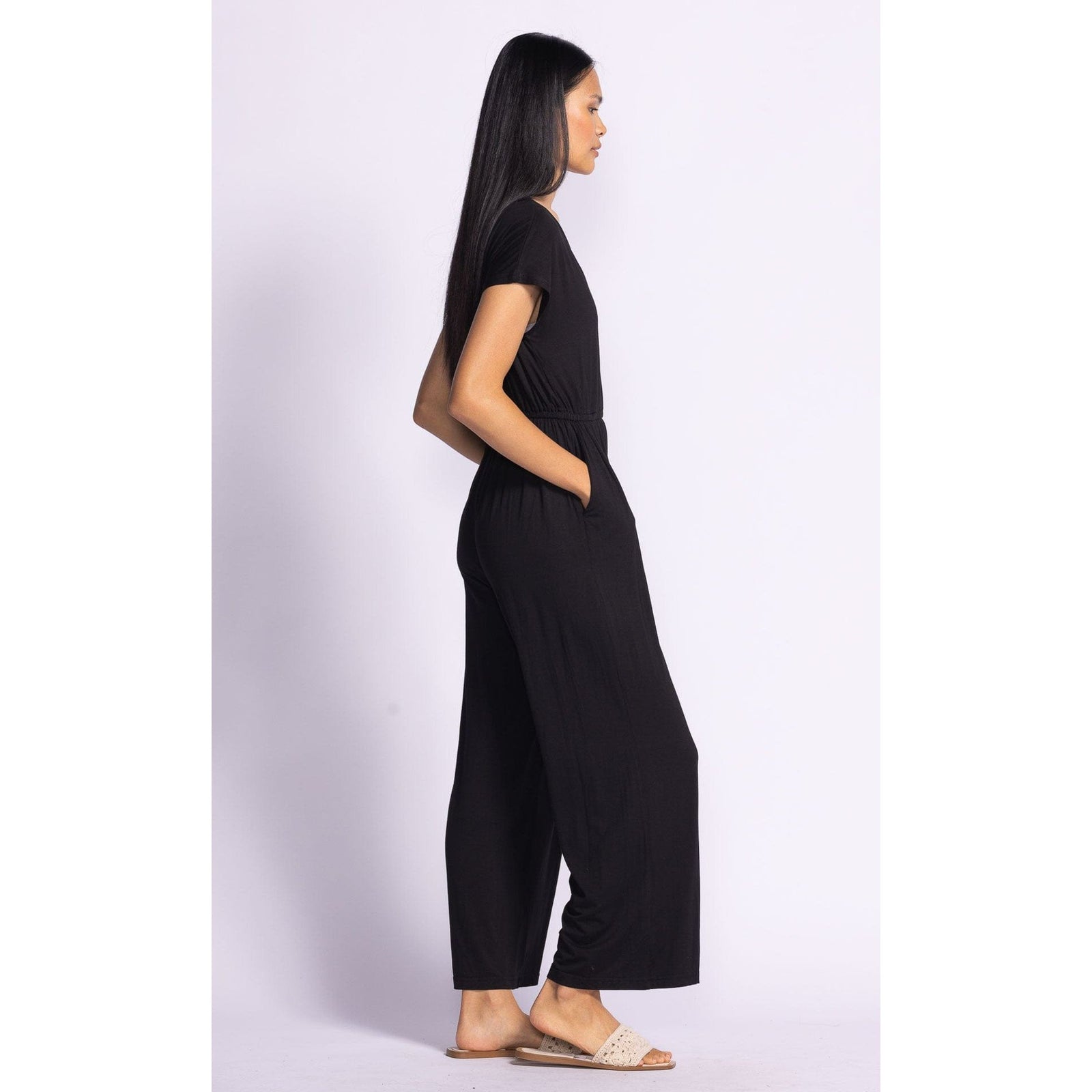 Versatile Pink Martini Eli Jumpsuit in black, perfect for dressing up or down for any occasion.