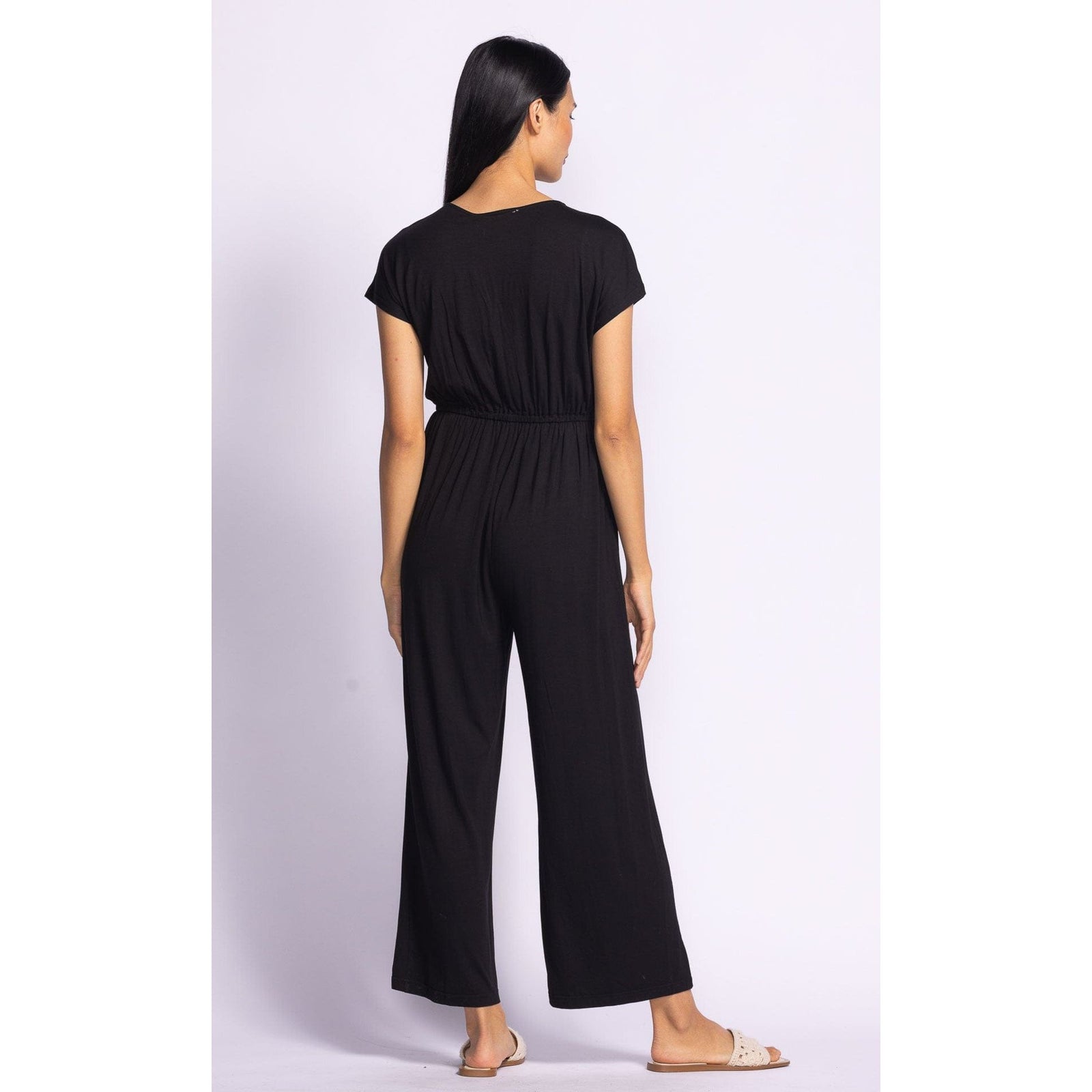 Stylish Pink Martini Eli Jumpsuit in black, a versatile wardrobe essential for casual or dressed-up looks.