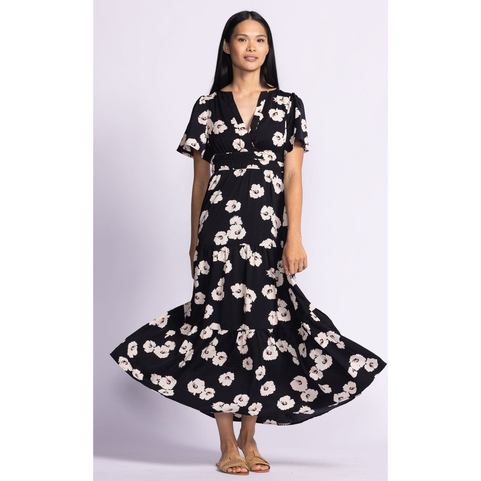 Stylish Pink Martini Margaret Dress with puffed sleeves and a flowy skirt, perfect for casual outings or dressy events.