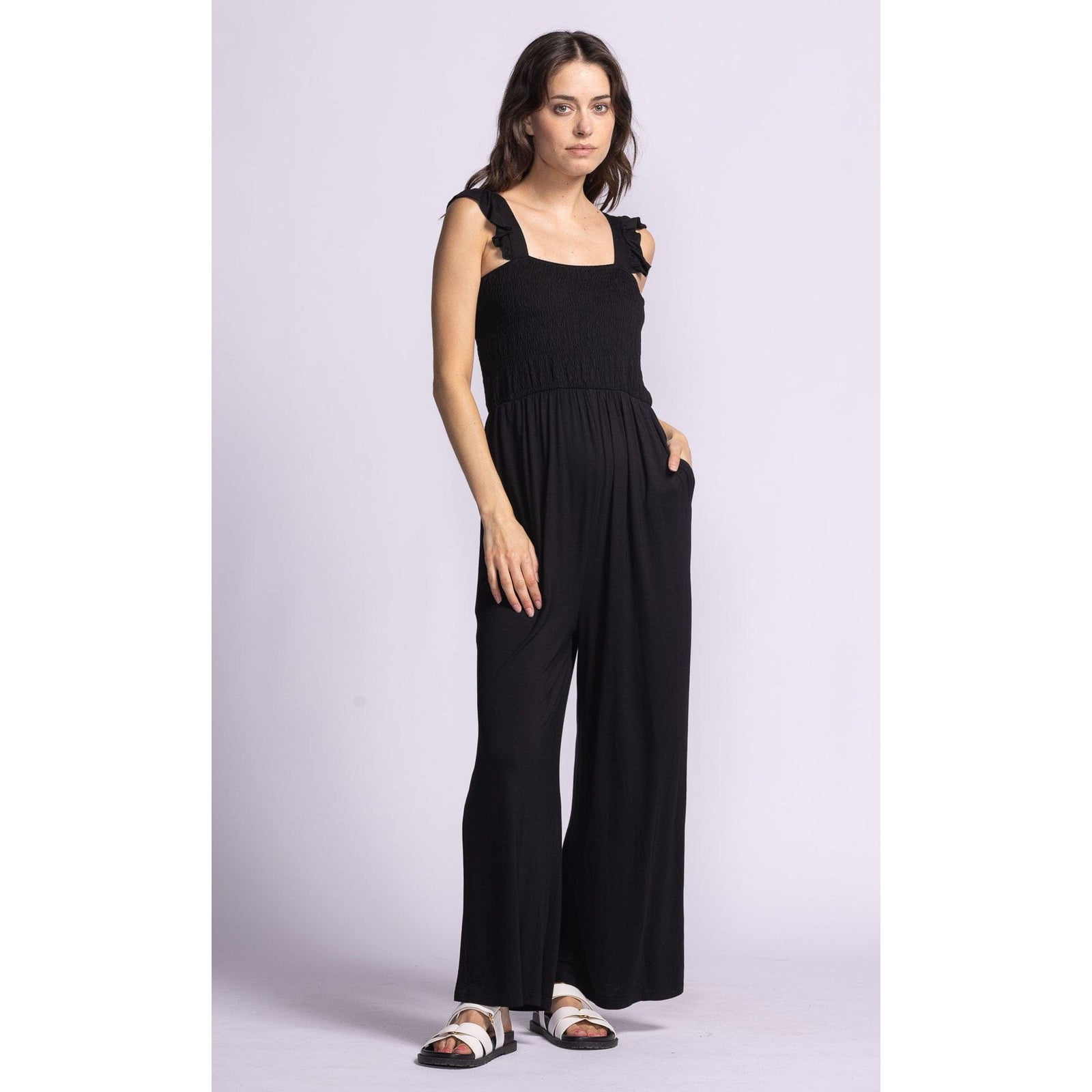 Stylish and comfortable, the Pink Martini Mav Jumper features a smocked bodice and pockets for casual summer wear.